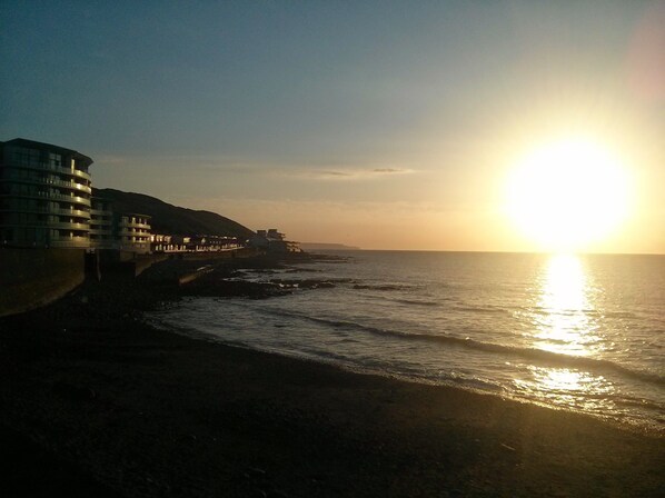 Apartment block from the village. Sunset.