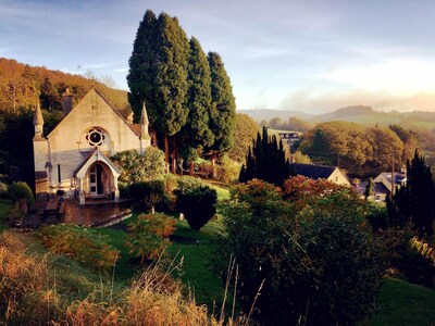 Fairytale Cotswolds chapel. Stunning valley views. 4 bedrooms.