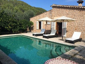 Private, south facing pool to rear of cottage.