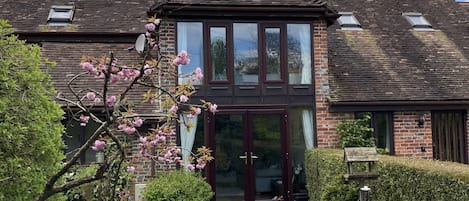 Floor to ceiling windows on the front of the house