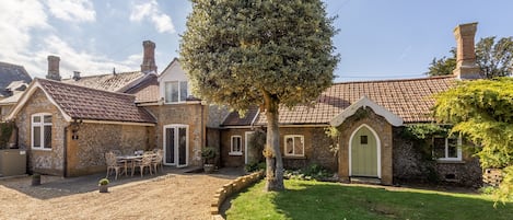 Toad Hall: Front elevation with garden and patio area