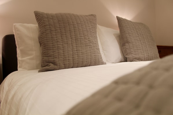 Comfortable double bed with luxurious crisp linen