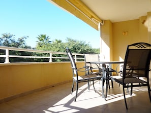 Balcony overlooks quiet park