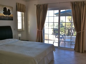 Our master bedroom with balcony overlooking the pool


