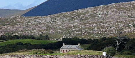 Pier Cottage with mountains behind