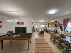 Open plan kitchen, dinner and games area