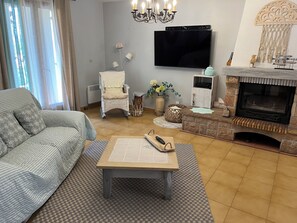 Séjour avec divan relax (inclinable) électrique