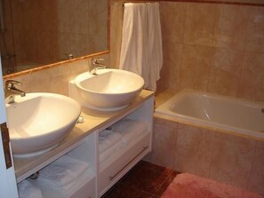 Bathroom of the Master Bedroom (ensuite), with Raindouche above the long bath