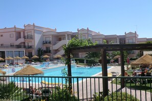 View of pool from childrens playground onsite