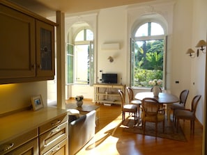 Air-conditioned living/dining room - view from Provençale open plan kitchen