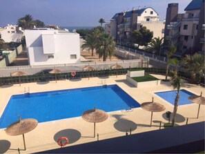 View of adult and baby pools from balcony.