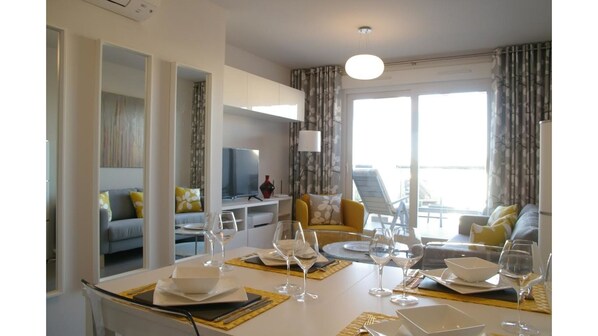 Living room with dining area.