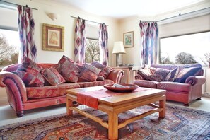 Sitting room with 55-inch Smart TV with Freesat, Netflix, Amazon and Disney