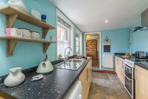 Ground floor: The kitchen is bright and cheerful