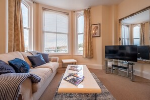 Lighthouse View, Cromer: Sitting room area with Smart television