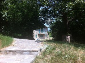 The house from the steps to pool