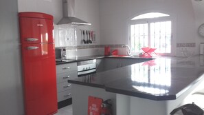 Well fitted kitchen with 'retro' fridge