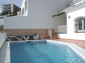 Pool with sun beds