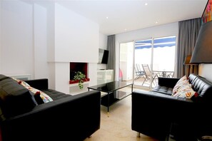 Modern lounge with access to the balcony with TV and WiFi