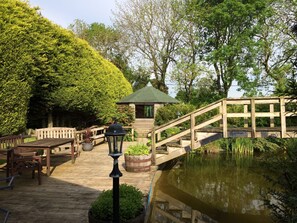 decked patio area
Pond
Summerhouse