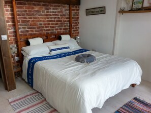 Main bedroom, the next photo is the view from, with a balcony overlooking the be