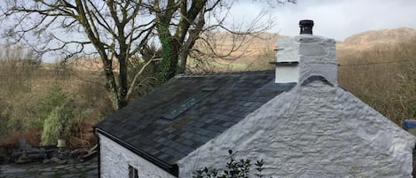 Rear view of Hen Gegin with views of Moel y Gest in the background