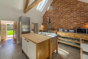 Ground floor: Open-plan kitchen/living area with vaulted ceiling