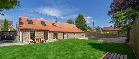 The Nurseries, Syderstone: Rear elevation with enclosed south facing garden