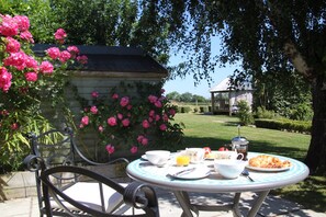 Your own sunny terrace for outdoor dining or quiet reading. 