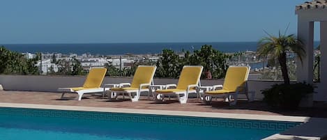 Pool area with view of Lagos and ocean