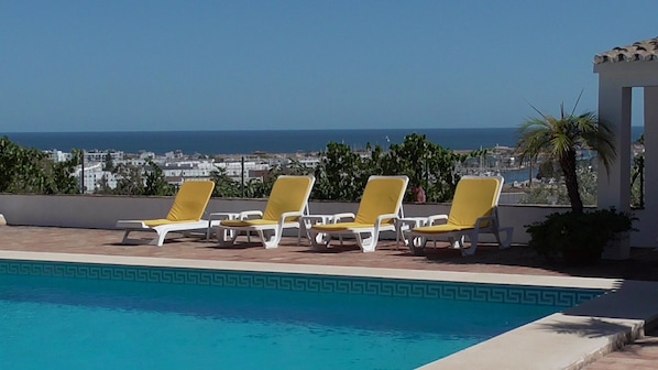 Pool area with view of Lagos and ocean