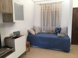 Day bed in lounge for a sleepy siesta.