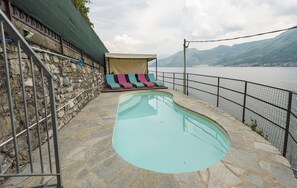 Swimming pool with lake view