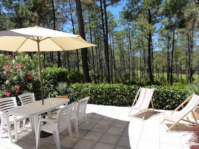 Casa con vista al campo de golf, entre el lago y el océano 