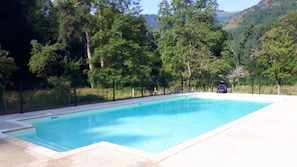 Here's our new 12m pool set in 1 hectare of parkland, with great mountain views
