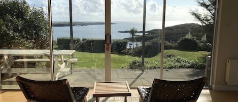 South-facing doors over Tralispean Bay