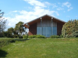 South-facing doors over Tralispean Bay with Terrace