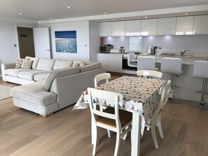 The sleek and comfortable kitchen/living area
