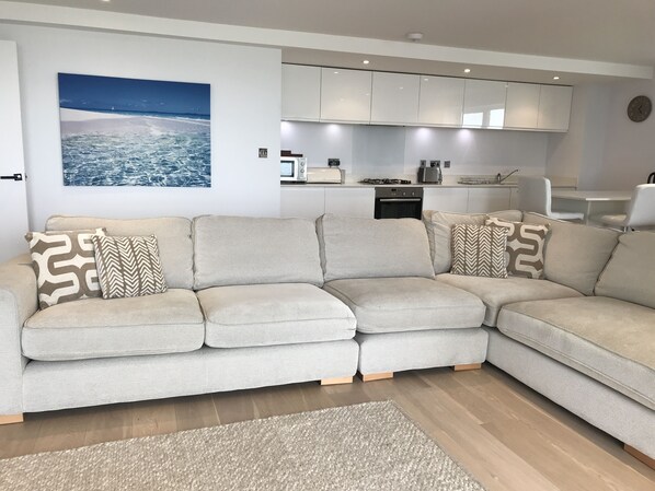 Vast comfy sofa to watch the waves from! 