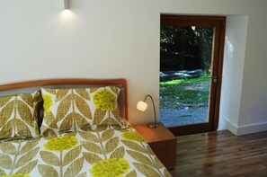 The master bedroom with private access to river