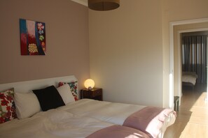 The pink bedroom (one of the three bedrooms)
