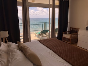 Seaview from the master bedroom bed