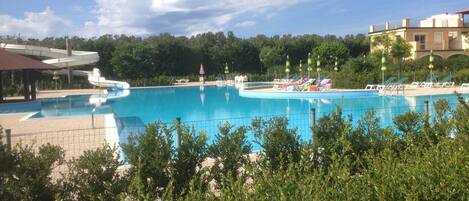 by the pool at 67g Pizzo Beach Club