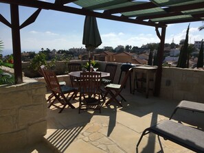 Private roof terrace and garden with views to the hills where you watch sunsets