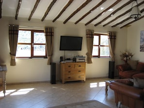 lounge with twin sofas, HiFi,  TV in all languages, SKY sports 