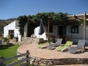 Front patio facing South to the sea