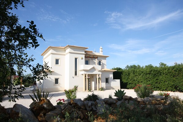 Front of Villa via private drive through automatic gate to 1.5 acre private plot