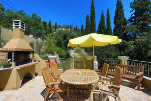 Dining table and umbrella
