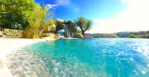 Pool waterfall cave and view