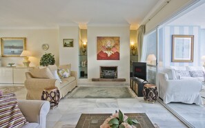 There are 4 seating areas in the very large reception including dining for 6.